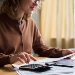 woman in 50 balancing business Finances