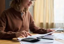 woman in 50 balancing business Finances