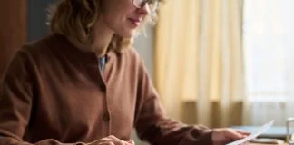 woman in 50 balancing business Finances