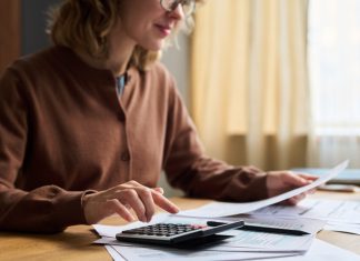 woman in 50 balancing business Finances