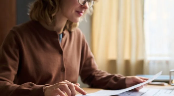 Balancing Personal and Business Finances When You’re in Your 50s woman in 50 balancing business Finances