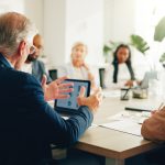 Managing in the Age of Superstar firms Superstar firms having a meeting in office for finance