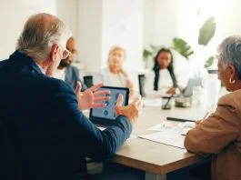 Managing in the Age of Superstar firms Superstar firms having a meeting in office for finance