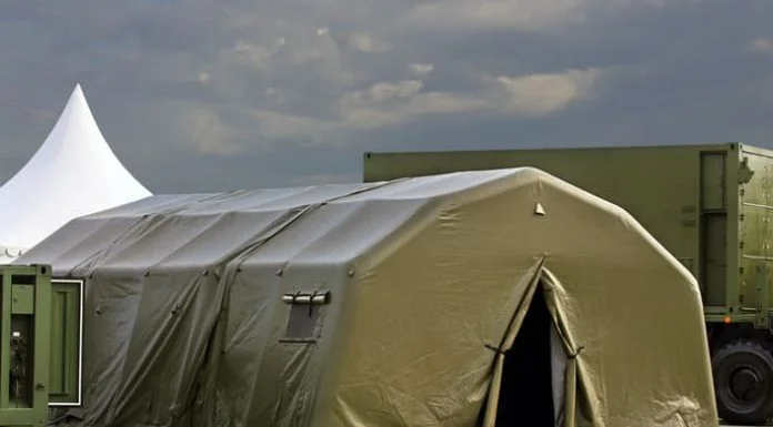 How Environmental Control Units Support Productivity and Performance Tent for placement of personnel on military range. Environmental control unit
