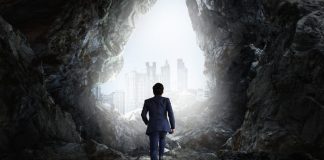 Businessman with principle of hardiness into action