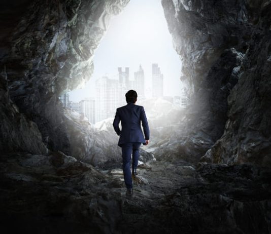 Businessman with principle of hardiness into action