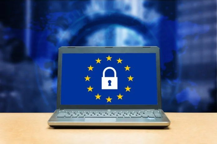 General Data Protection Regulation - laptop on a table, blue screen with GDPR CER directive and GDPR
