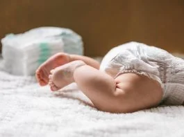Gentle Care for Little Ones: Choosing the Right Newborn Diapers for Your Baby A baby in a diaper