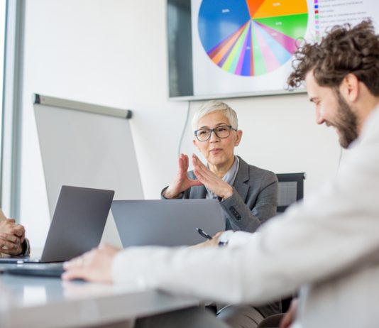 Beyond Gut Feelings: What Today’s CEOs Need to Survive and Succeed CEO using technology for presenting data