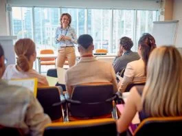 Why Corporate Training is Not Just For New Employees Corporate - business woman holding presentation