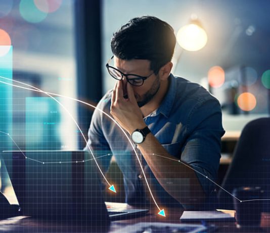 Man, headache and stock market crash, financial fail or business investment mistake in night office overlay.