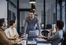 Business leader showing credibility during a meeting