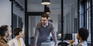 Business leader showing credibility during a meeting