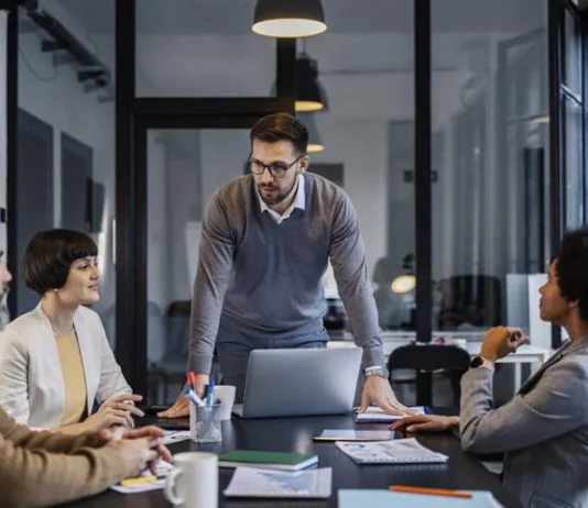 Business leader showing credibility during a meeting