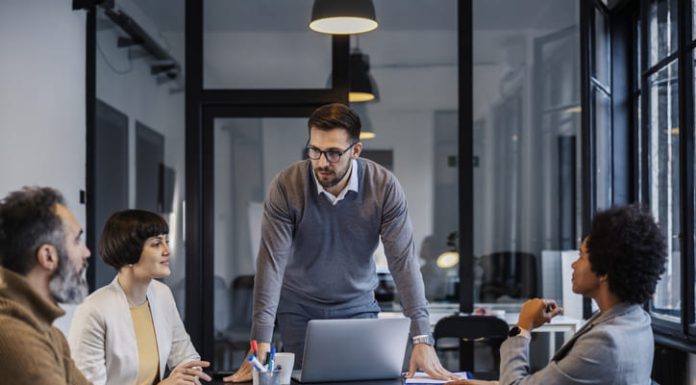 5 Body Language Mistakes that Kill Your Credibility Business leader showing credibility during a meeting