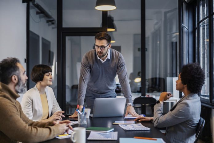 Business leader showing credibility during a meeting