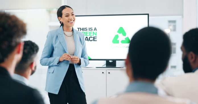 Business people, hospitality, sustainability and woman with presentation, conference or ecology with partnership, corporate training or carbon footprint.