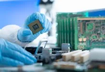 Semiconductor Industry Enters New Growth Cycle Person working in semiconductors industry