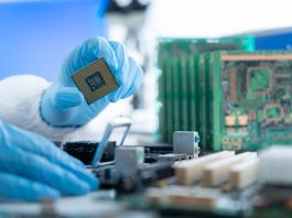 Semiconductor Industry Enters New Growth Cycle Person working in semiconductors industry