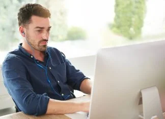 Data Scraping: A Great Lead Generator Data Scraping - Man with earphones working