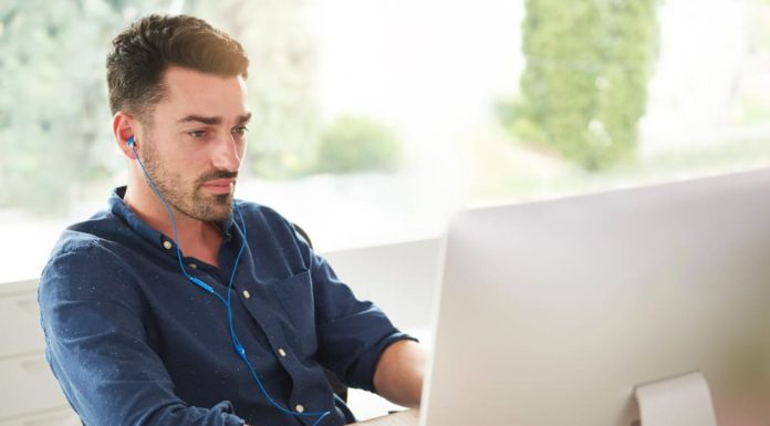 Data Scraping: A Great Lead Generator Data Scraping - Man with earphones working