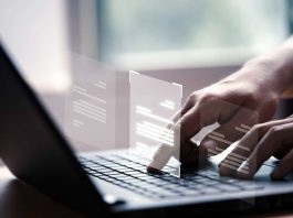 How to Prevent Data Loss When Converting PDFs Into Forms Prevent data loss - Hand using laptop