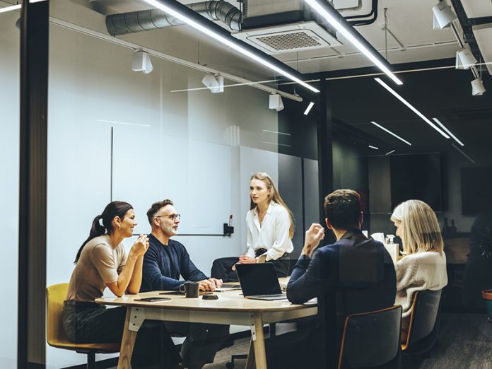 Group of colleagues having a meeting in a boardroom Organization - Where’s Your Sense of Justice?