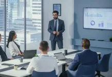 Gartner: Boardroom Strategies for Dominating AI Investments, Risks, and Value Office Conference Room Meeting: Digital Enterpreneur Presents e-Commerce Investment Strategy for Group of Investors. Boardroom Strategies for Dominating AI Investments, Risks, and Value