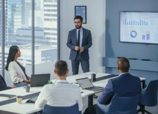 Gartner: Boardroom Strategies for Dominating AI Investments, Risks, and Value Office Conference Room Meeting: Digital Enterpreneur Presents e-Commerce Investment Strategy for Group of Investors. Boardroom Strategies for Dominating AI Investments, Risks, and Value