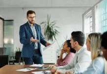 Why Management Distrusted the One Force That Actually Changes Culture Group of young business people having a meeting or presentation and seminar in the office or culture.
