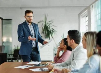 Why Management Distrusted the One Force That Actually Changes Culture Group of young business people having a meeting or presentation and seminar in the office or culture.