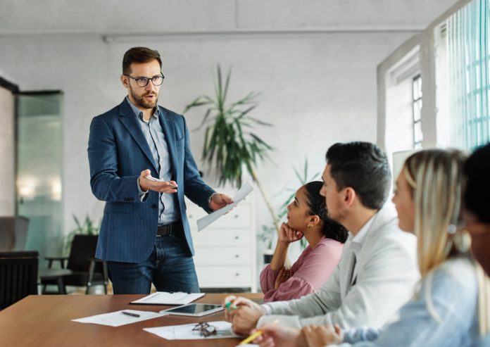 young business people meeting office teamwork group presentation seminar man businessman startup project idea student training education entrepreneur Group of young business people having a meeting or presentation and seminar in the office or culture.