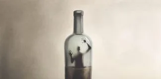 Addiction Has No Boundaries: We Must Start Talking About It Illustration of man imprisoned in a bottle of alcohol, surreal addiction abstract