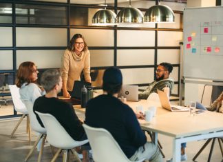 How to Use Storytelling to Retain and Engage Top Talent They work together as a team, brainstorming creative ideas for a successful tech company project. Guided by a confident leader, their collaboration fosters a professional and innovative workplace environment. Storytelling for Talent Retention concept.