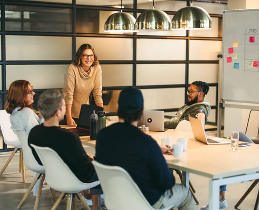 How to Use Storytelling to Retain and Engage Top Talent They work together as a team, brainstorming creative ideas for a successful tech company project. Guided by a confident leader, their collaboration fosters a professional and innovative workplace environment. Storytelling for Talent Retention concept.