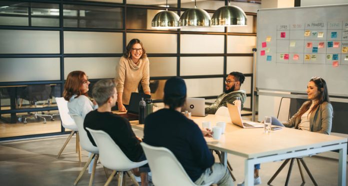 iStock-1866732876 (1) They work together as a team, brainstorming creative ideas for a successful tech company project. Guided by a confident leader, their collaboration fosters a professional and innovative workplace environment. Storytelling for Talent Retention concept.