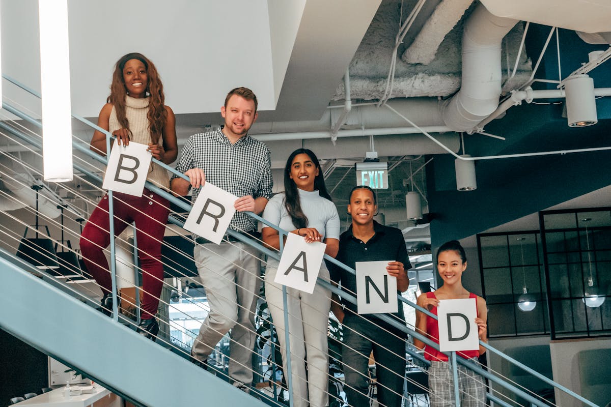 Happy Coworkers Standing on a Stairway
