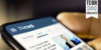 Person checking article online. Editorial Credibility concept