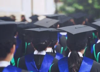 shot of graduation hats during commencement success graduates of the university, Concept education congratulation Student young the graduates in University. MBA vs. Skills-Based Learning concept