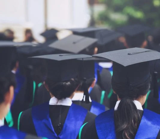 shot of graduation hats during commencement success graduates of the university, Concept education congratulation Student young the graduates in University. MBA vs. Skills-Based Learning concept