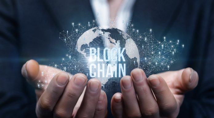 Blockchain Intelligence. Hands of businesswoman support the block chain .