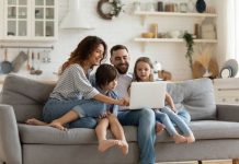 From Trackers to Intelligent Companions: The Future of Parenting Apps Family enjoying parenting apps