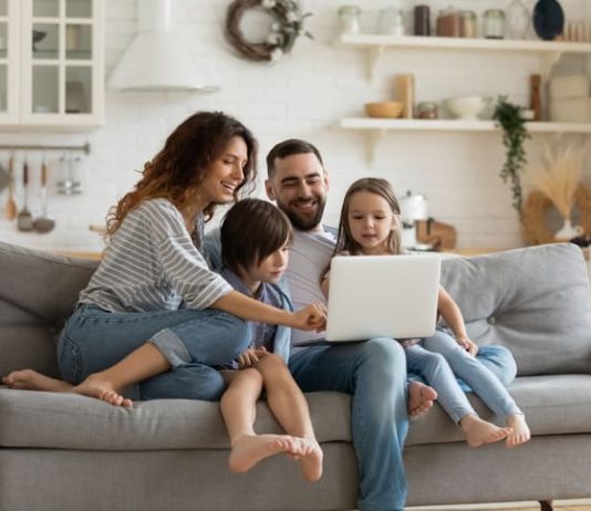 Family enjoying parenting apps