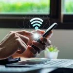 Wifi internet access concept, Business people connect WiFi technology. connect instantly via smartphone and high-speed hotspot on Gigstreem.