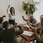 How to Lead With M.A.G.I.C.: The Framework Redefining Confidence, Clarity and Culture Businesswoman motivating her team members and leading the team with confidence