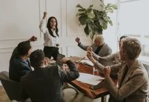 How to Lead With M.A.G.I.C.: The Framework Redefining Confidence, Clarity and Culture Businesswoman motivating her team members and leading the team with confidence
