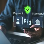 How Secure Payment Processing Protects Your Business and Customers A person using a smartphone and laptop with holographic payment icons, secure shield, and success symbols. Concept of secure online payment