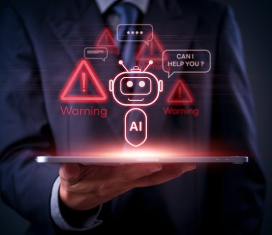 AI, technology, and cybersecurity warnings displayed as red holograms above a tablet in businessman hand, future chatbot. AI Agents for Fraud Detection concept