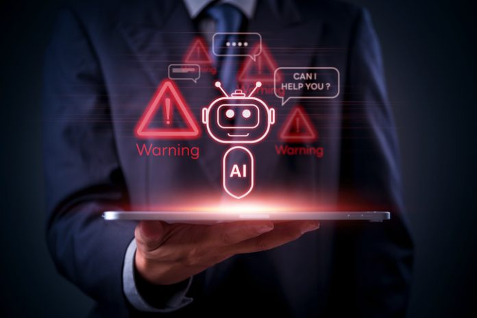 AI, technology, and cybersecurity warnings displayed as red holograms above a tablet in businessman hand, future chatbot. AI Agents for Fraud Detection concept