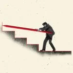 Healing, Identity, and the SelfCleaning Leader Businessman pushing giant red pencil up staircase symbol of challenge strategy and persistence in career.